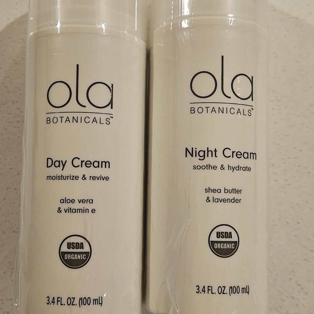 Ola botanicals day cream and night cream set. New, sealed bottles.